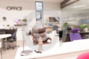 AbstractÃÂ blurred of modern office work space of table work in office . ideal for presentation background photo